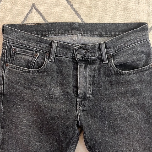 Vintage Levi’s black wash jeans - Picture 2 of 12